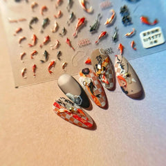 POWPOP decal being placed with tweezers showing precise placement benefit