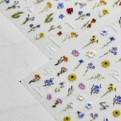 POWPOP sheet held in hand to show size and number of nail decals
