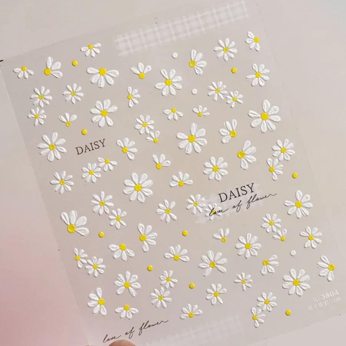 POWPOP sheet beside hand showing sticker size and usage clarity