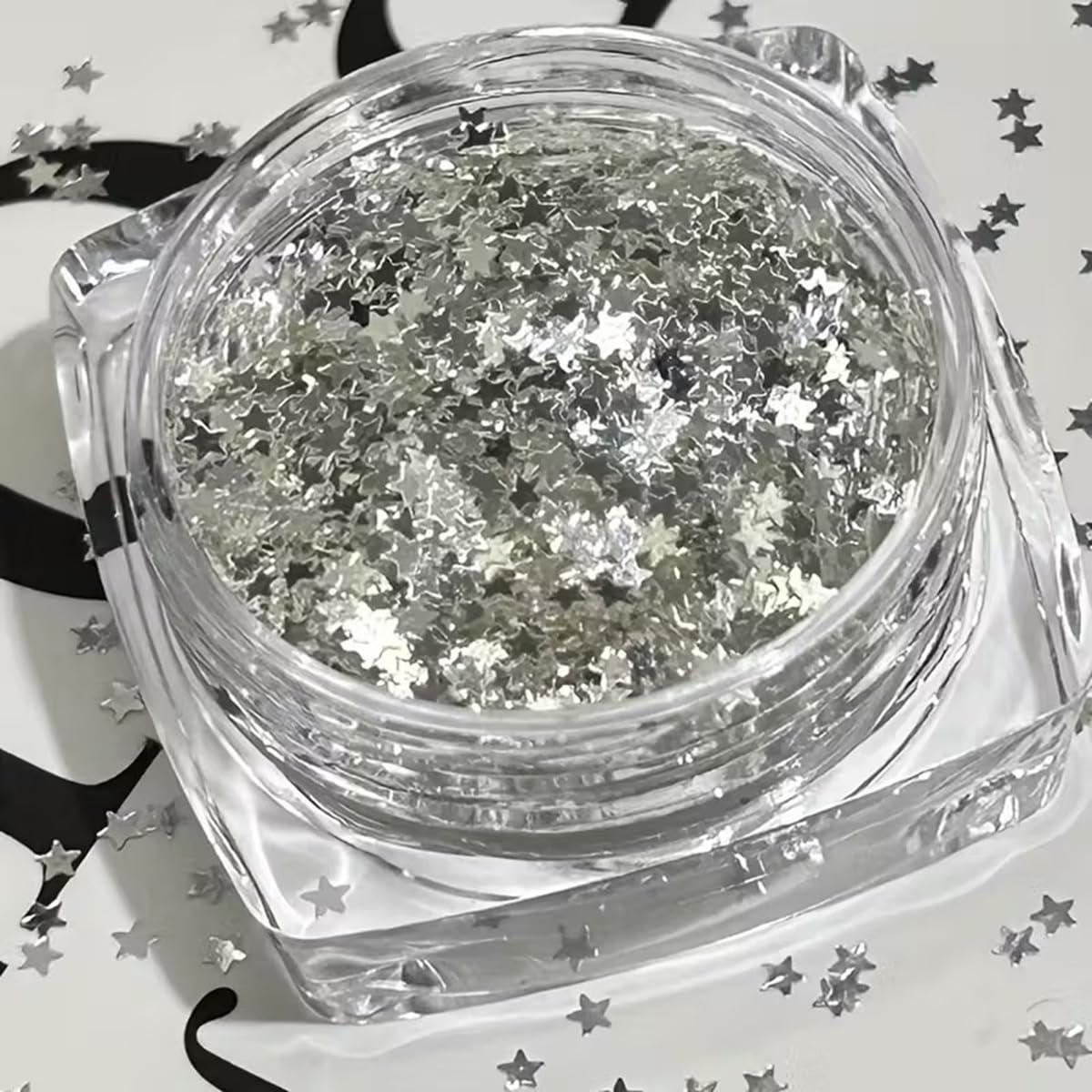 POWPOP star shapes close-up showing multiple sizes and reflective finish for dimension