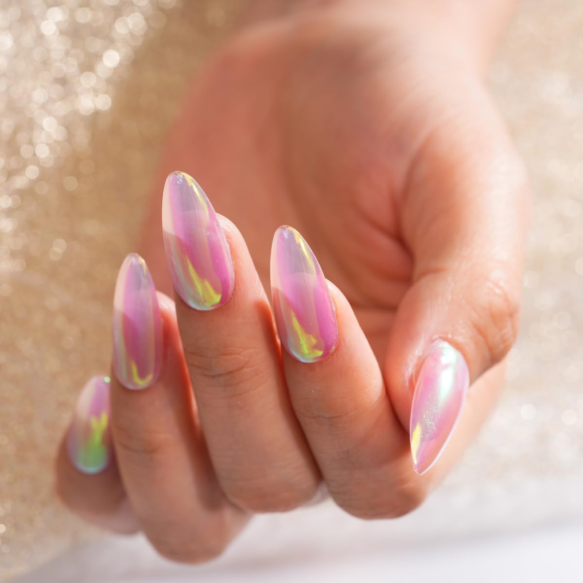 Pretty Diva aurora powder on dark base nail producing vivid green yellow chameleon shift