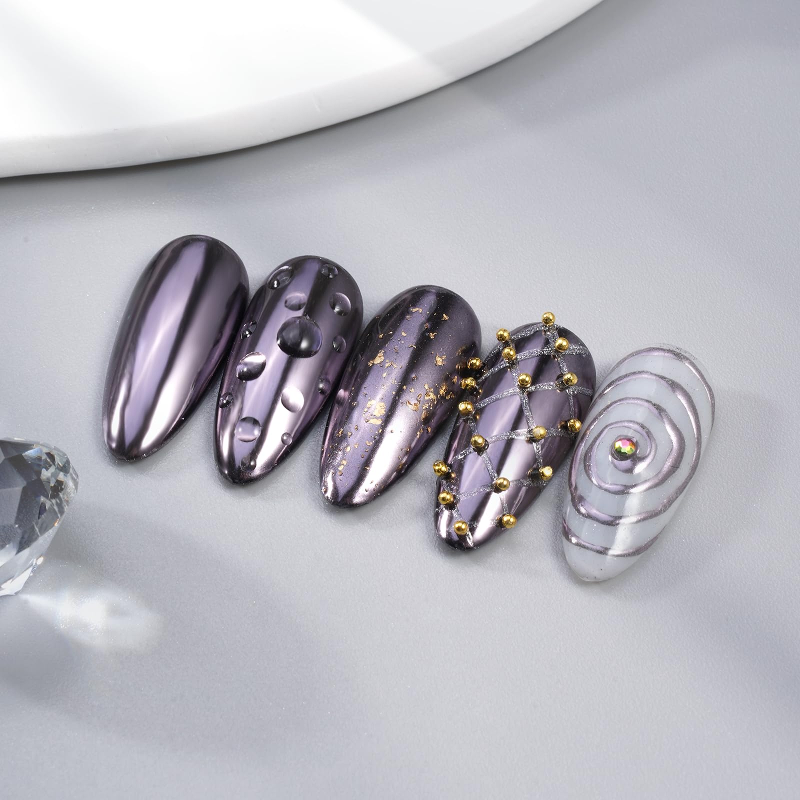 Pretty Diva on nail swatch full mirror finish benefit: high-shine silvery-black chrome effect