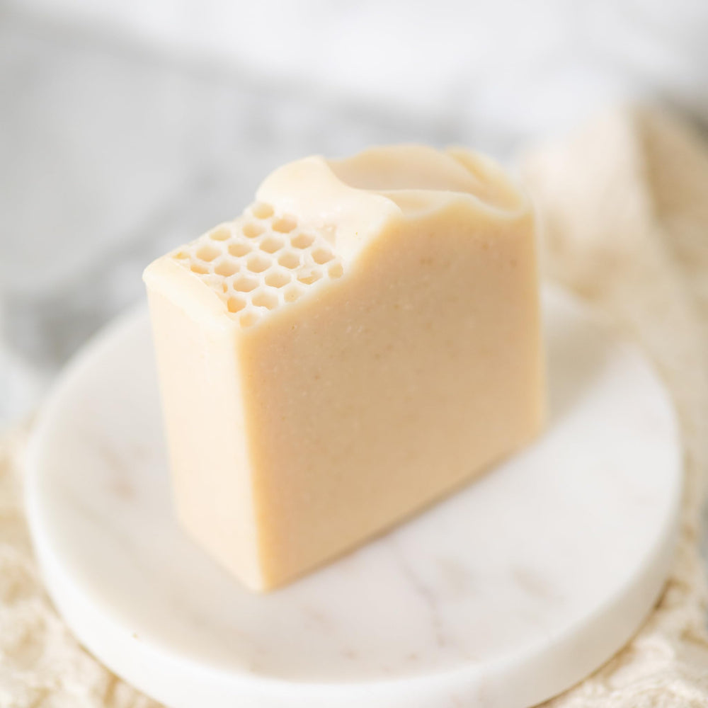 Pretty farm girl close-up of soap texture highlighting creamy lather