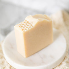 Pretty farm girl close-up of soap texture highlighting creamy lather