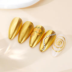 PrettyDiva finished full-set nails with gold mirror chrome giving dramatic salon-quality shine