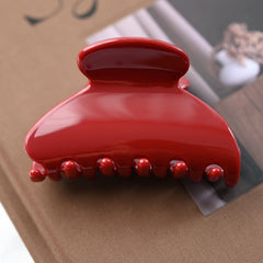 Prettyou close-up acetate texture highlighting glossy polish