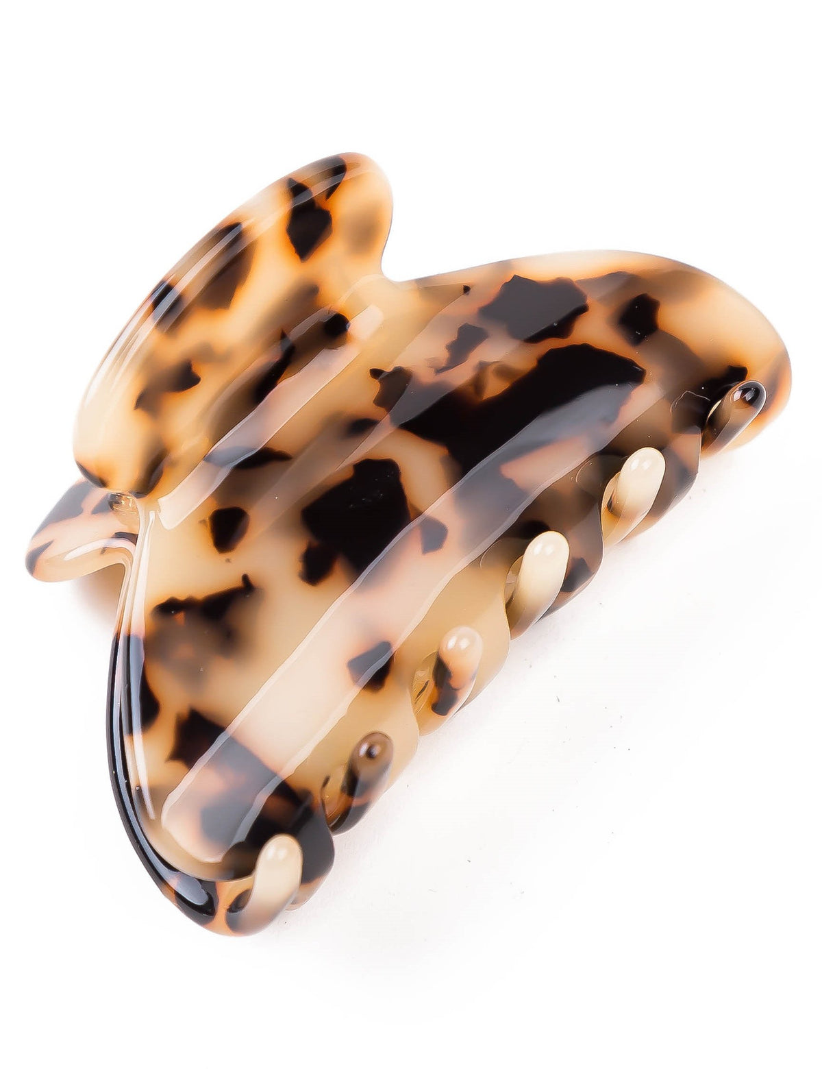 Prettyou front view tortoiseshell claw showing elegant pattern and secure hold