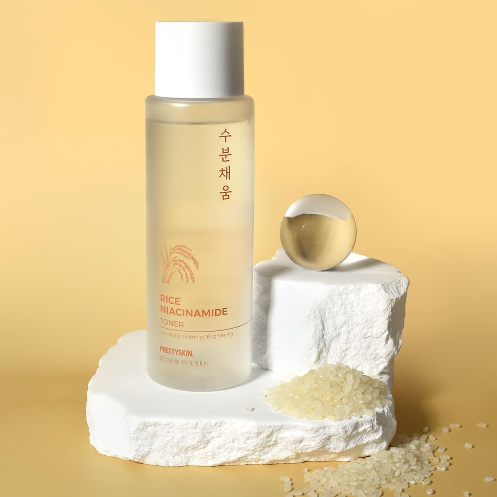 PRETTYSKIN bottle held in hand to demonstrate true 250ml scale and convenience