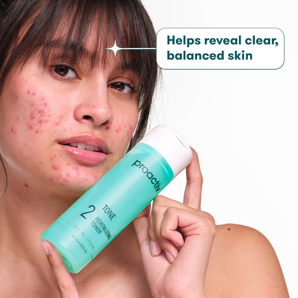 Proactiv toner in hand for scale to demonstrate 6 fl oz size and travel-friendly benefit