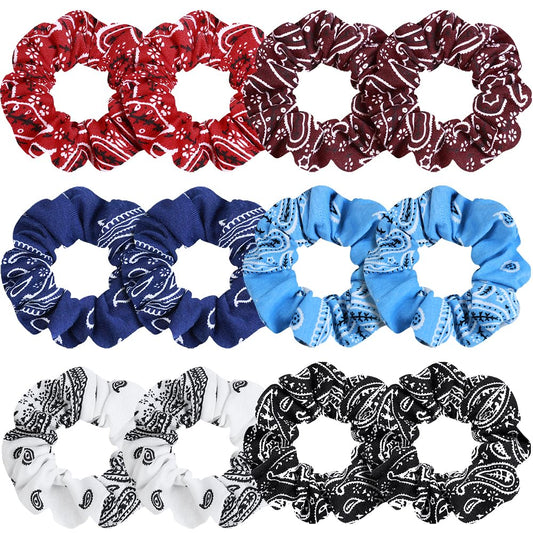 PROPOG bandana print set laid flat showing twelve colorful scrunchies and matching outfits