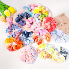 PROPOG scrunchie worn on wrist as accessory adding convenient styling option