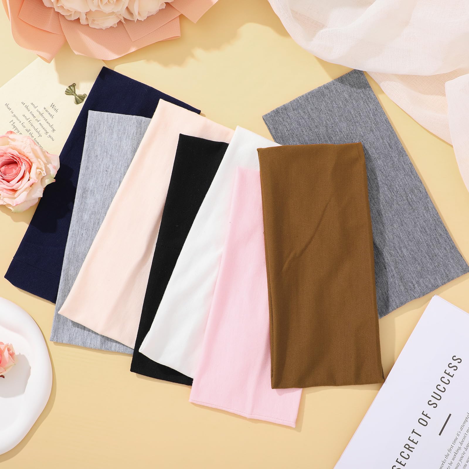 ProSuites eight headbands fanned out displaying color variety and outfit-matching benefit