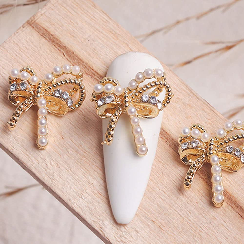 Prudiut pearls decorating a hair clip for bridal hairstyle enhancement