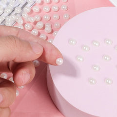 Prudiut pearls applied on face for festival look adding instant shimmer