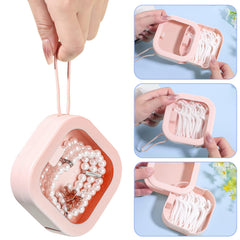 Prudiut open container showing hair ties inside for neat tangle-free storage