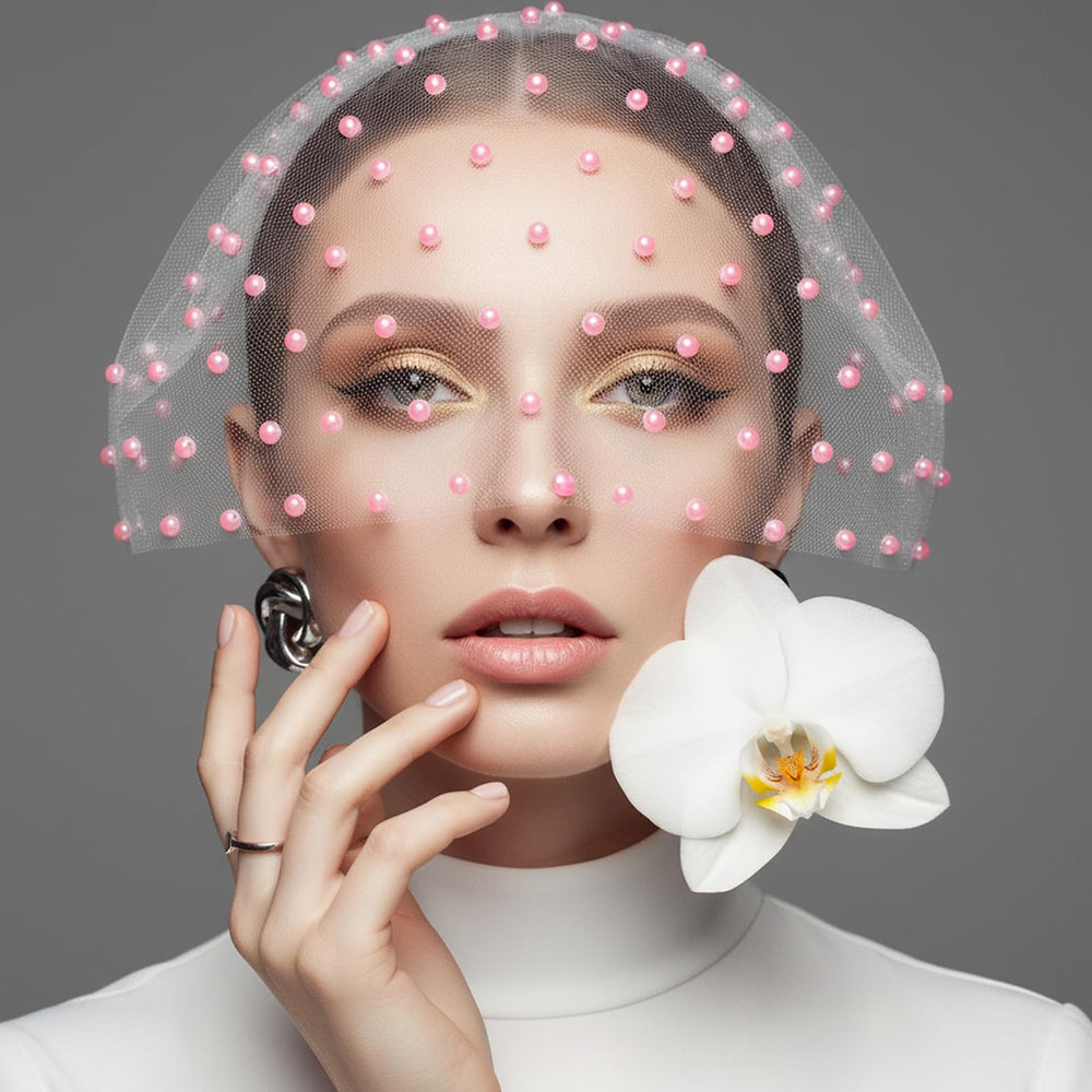 Prudiut pearls applied to model face for festival-ready decoration benefit
