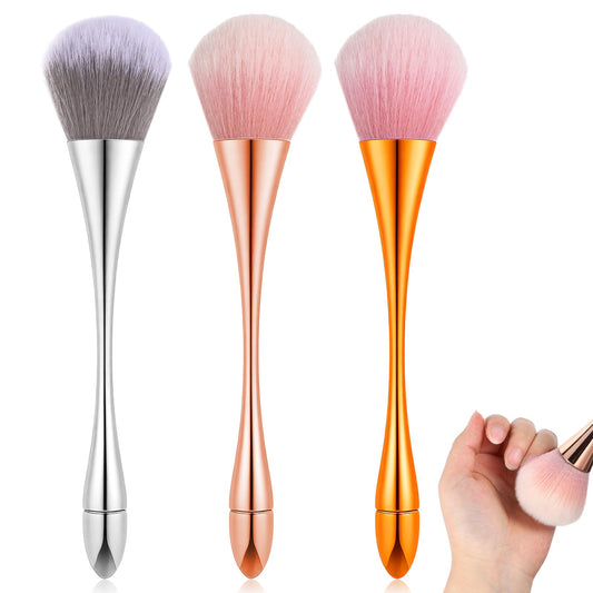 Psiriol front view of three metallic nail dust brushes, neat kit benefit