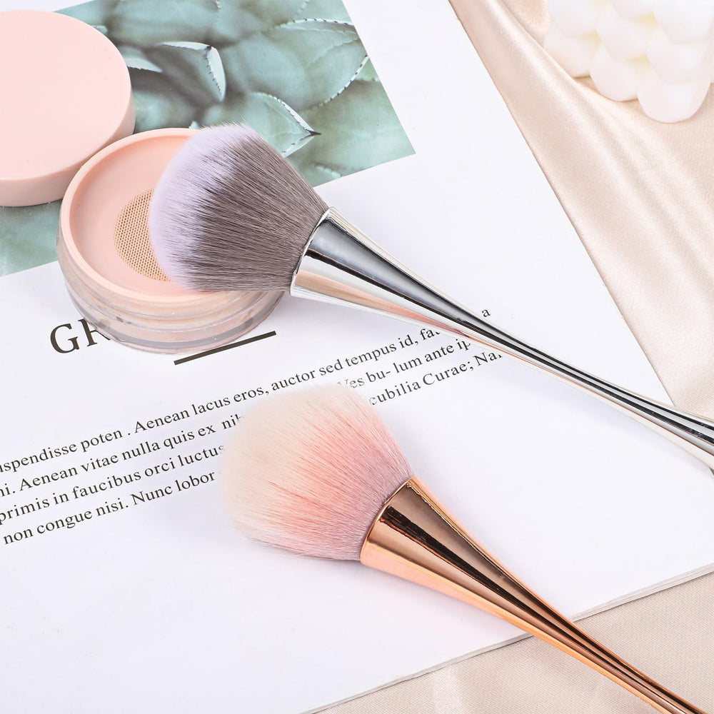 Psiriol brush sweeping acrylic dust off nail surface for cleaner manicure