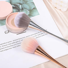 Psiriol brush sweeping acrylic dust off nail surface for cleaner manicure
