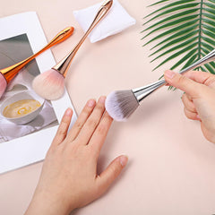 Psiriol brush applying blush for gentle, even makeup blending