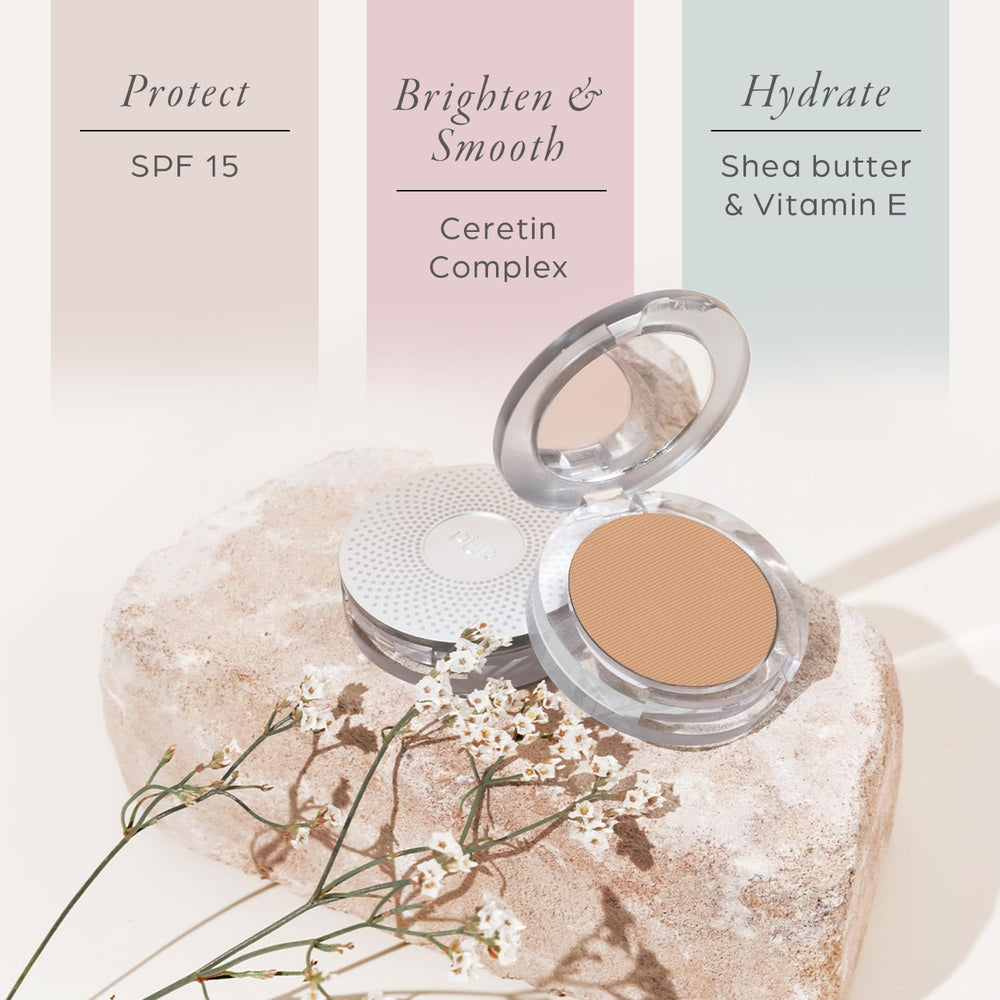 PÜR MINERALS compact held in hand showing mirror and size for easy on-the-go application