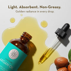 Pure Body Naturals smoothing oil through hair to reduce frizz and add shine