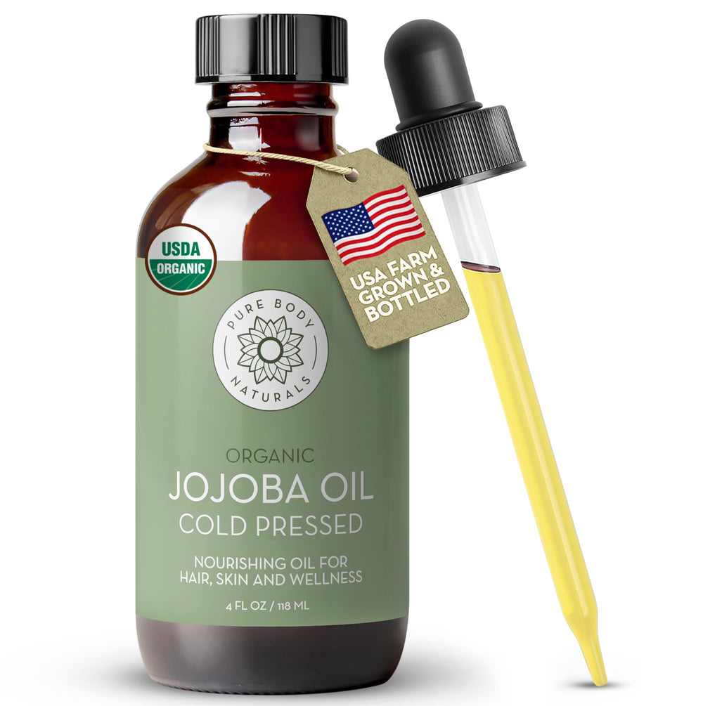 Pure Body Naturals front bottle showing label and amber glass protecting oil