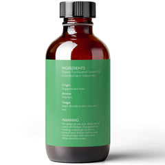 Pure Body Naturals 4 fl oz bottle beside a measuring cup for scale clarity