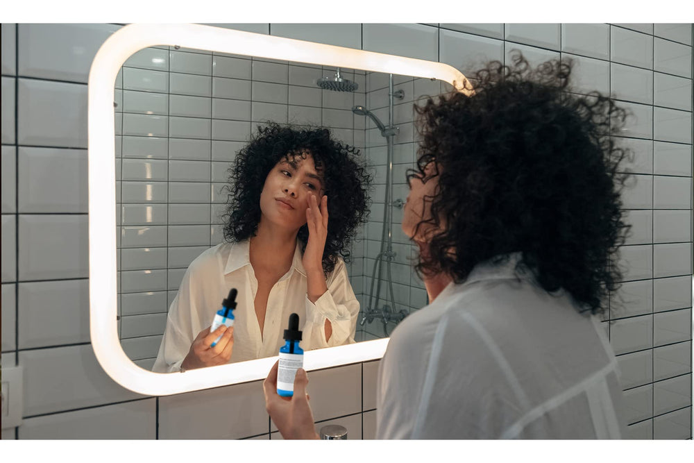PURE ORIGINAL INGREDIENTS hand applying serum showing targeted spot treatment benefit
