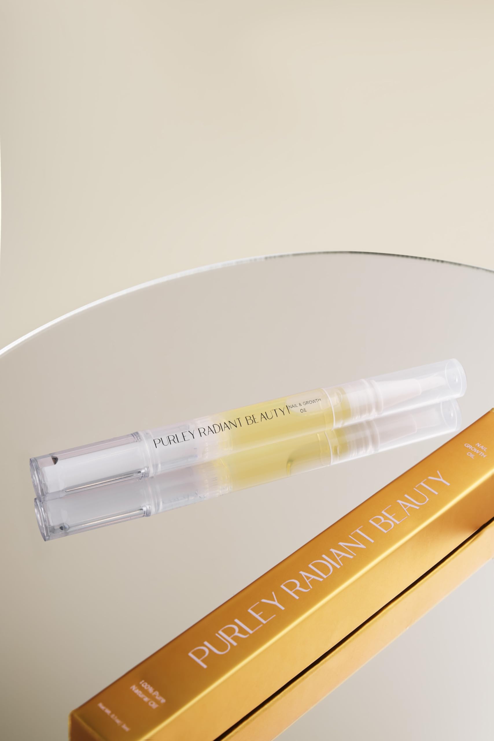 Purely Radiant nail oil on vanity with manicure tools showing everyday use