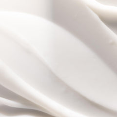 Pureology hydrate sheer being applied to damp hair demonstrating detangling benefit