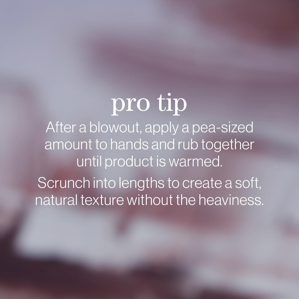 Person with styled hair using Pureology paste showing natural texture and shine