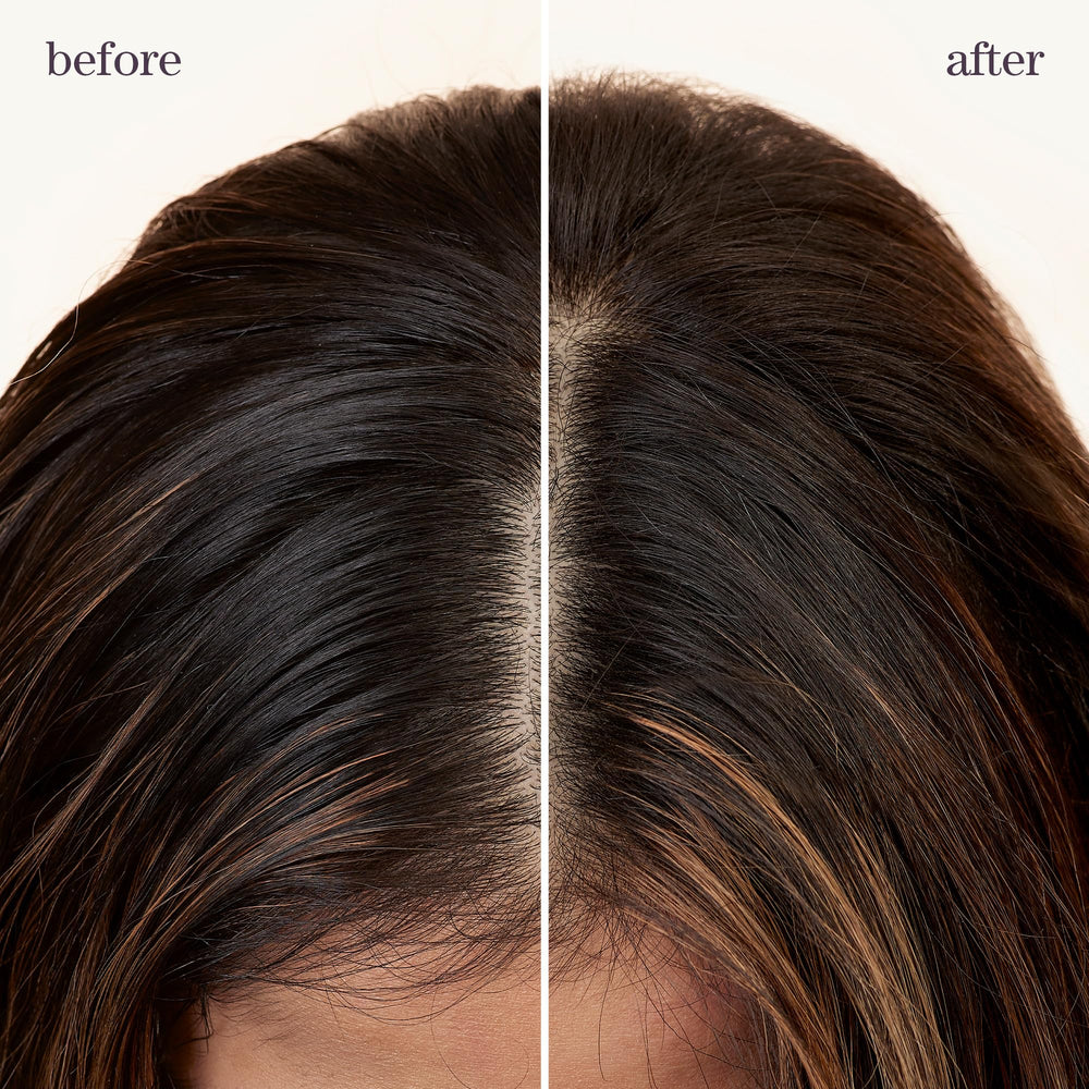 Model applying Pureology dry shampoo for instant root refresh and volume