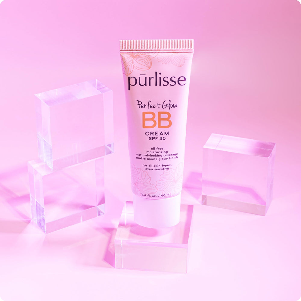 pūrlisse tube beside a ruler showing 1.4 oz size for scale and portability