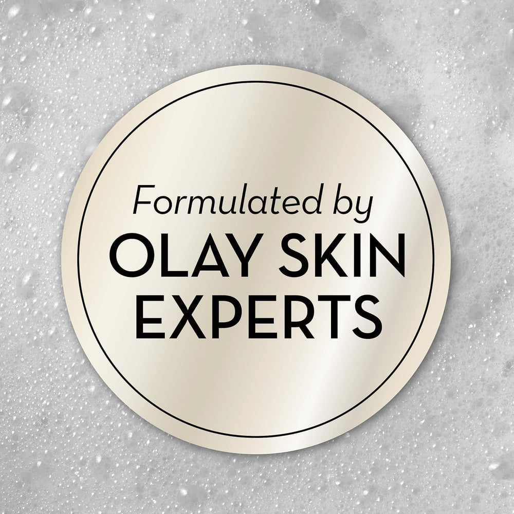PURPUR Olay bottle in hand demonstrates compact 3 oz size ideal for carry-on convenience