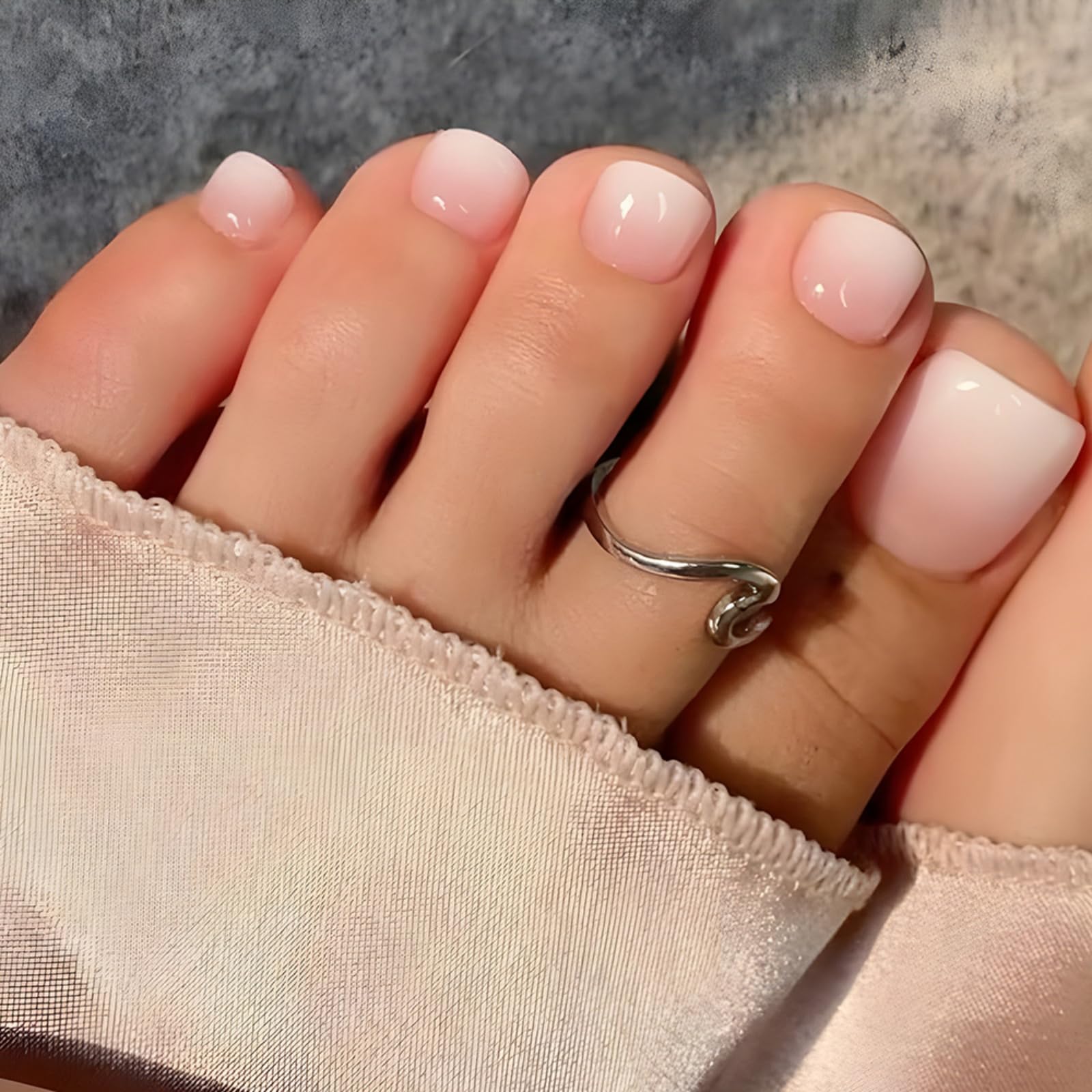 Puyokinm front packaging showing 24-piece toe nail kit and contents for quick styling