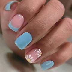 Puyokinm in use as a woman presses a press-on nail on for fast at-home manicure