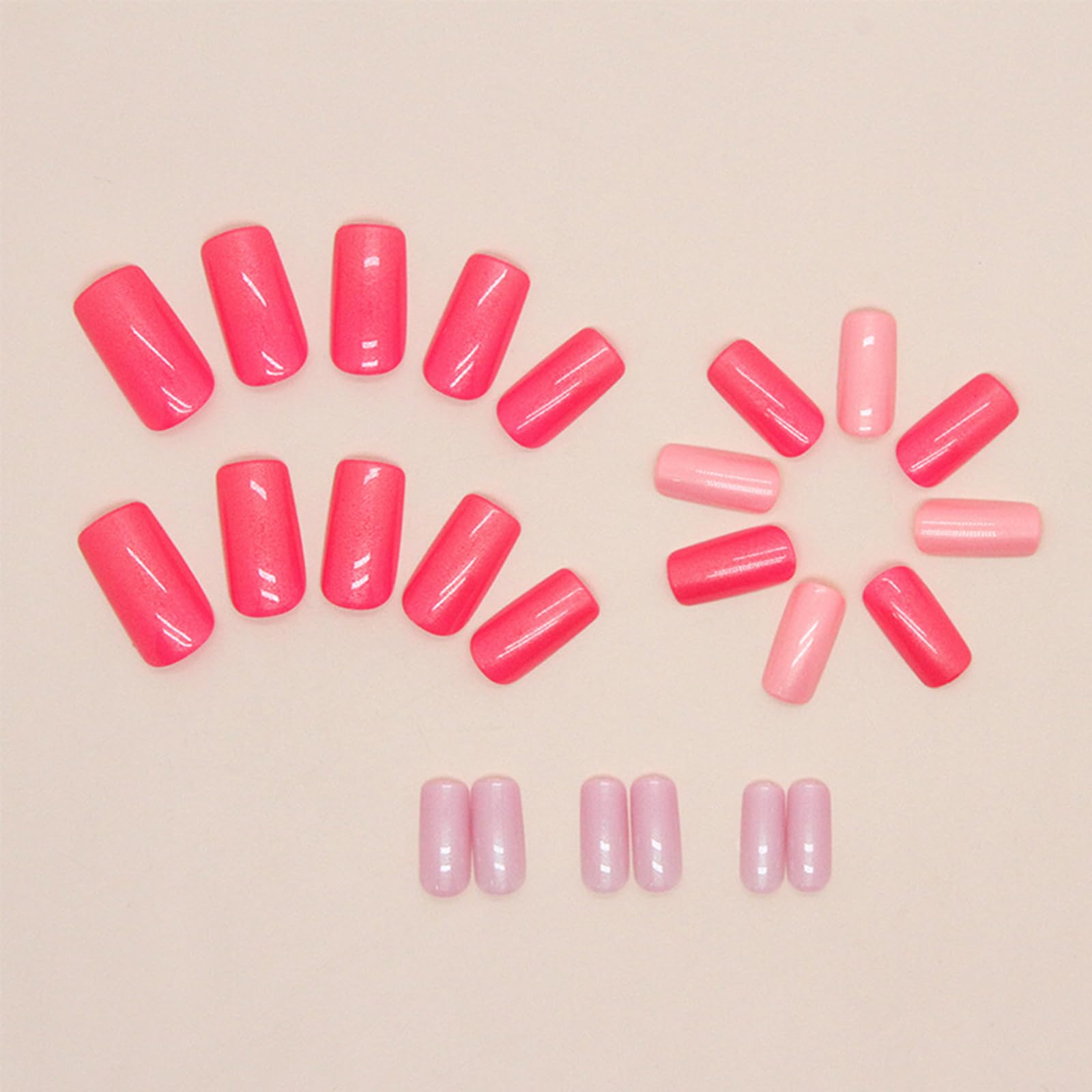 Puyokinm lifestyle shot of woman wearing pink aurora nails for instant salon look