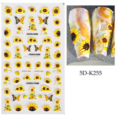 Puyokinm single sunflower decal applied on a fingernail for instant summer manicure benefit
