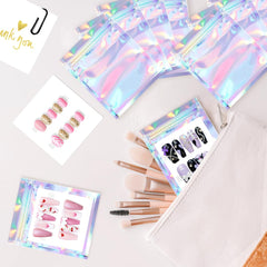 Qenk flatlay of bags, cards and tape styled for small business branding