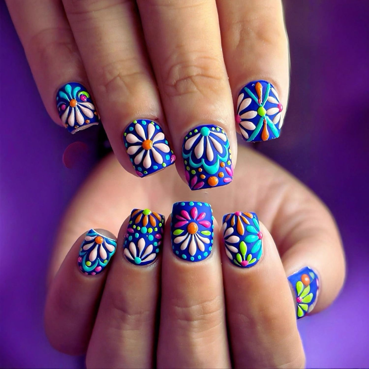 QEYRIYI front packaging showing blue daisy nails and included tools for easy start