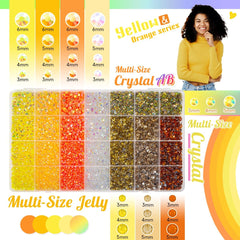 qiipii open box revealing 28 grids of yellow, orange and crystal rhinestones for organized crafting