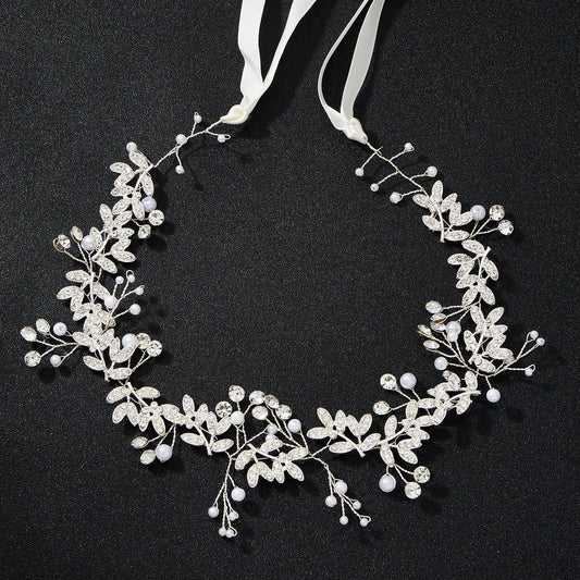 QIUTIMIY close-up of pearls and crystals highlighting handmade detail