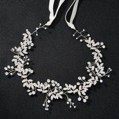 QIUTIMIY close-up of pearls and crystals highlighting handmade detail