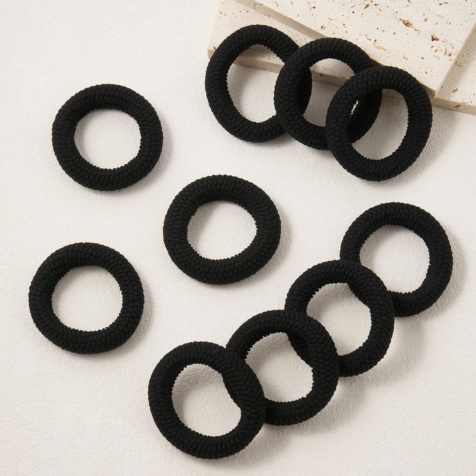 QIUTIMIY hair ties arranged on a vanity to show everyday styling convenience