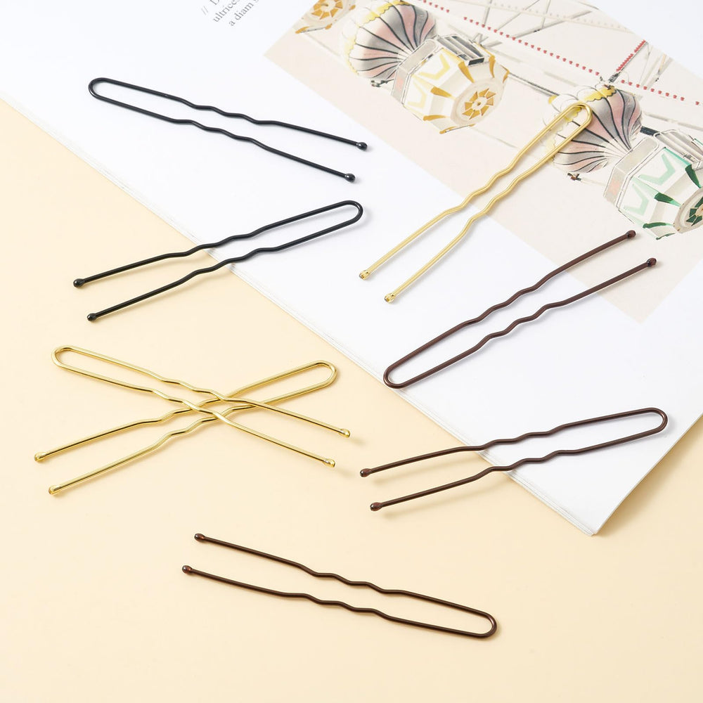 QIUTIMIY close-up of pin texture and smooth rounded tip, gentle on hair and scalp