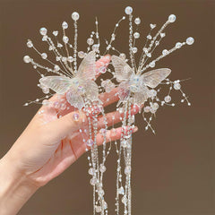 Qojai flatlay of both butterfly clips in package for gifting presentation benefit