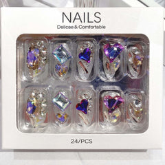 QQPPOLIU nails beside a coin to show scale and wearable medium length