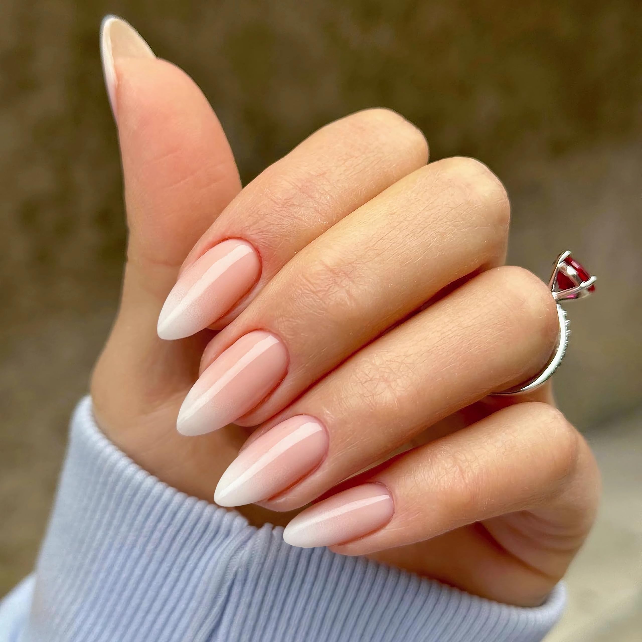 Qsnidy close-up of ombre nude-to-white shades showing salon-like glossy finish