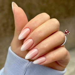 Qsnidy close-up of ombre nude-to-white shades showing salon-like glossy finish